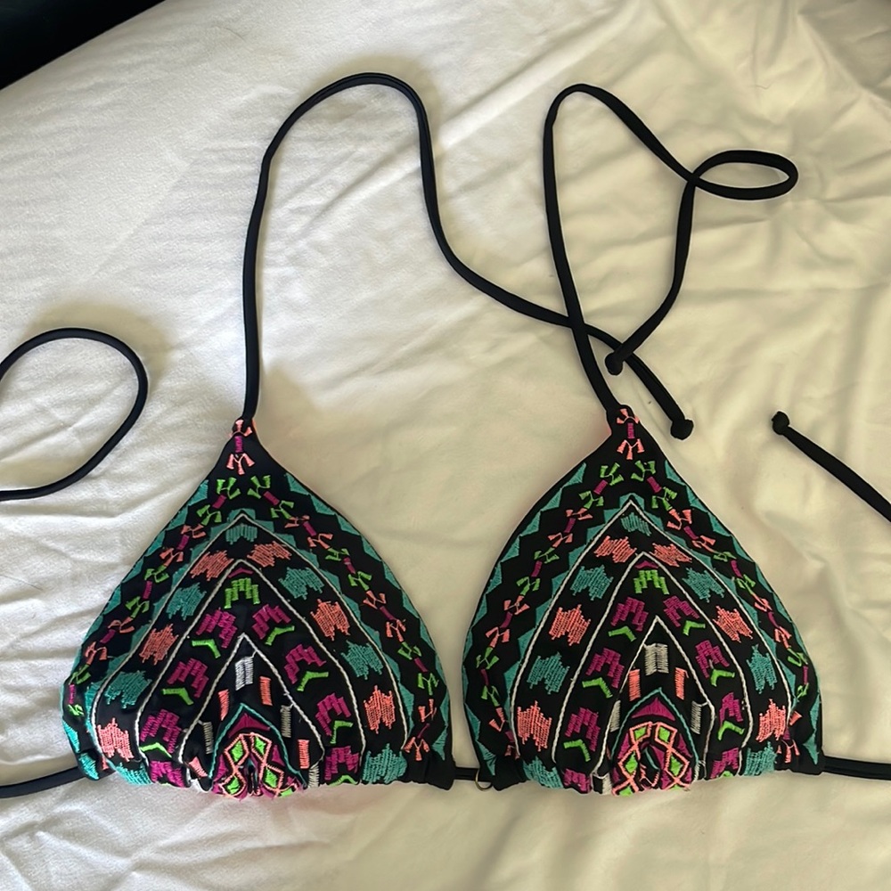 Black bikini top with bright embroidered detailing
